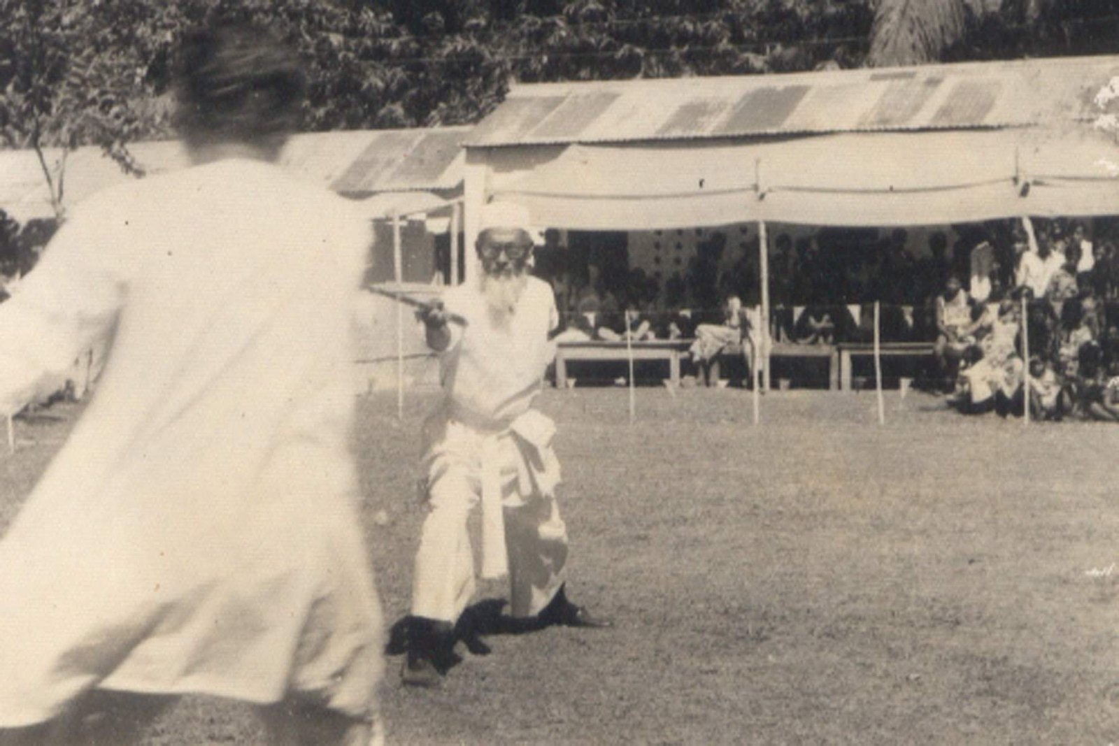 Image-6, national Lathikhela Shiksha Shibir. Ustad Bhai demonstrating Lathi Khela.jpeg Photo Credit-Lathial Bahini, Kushtia